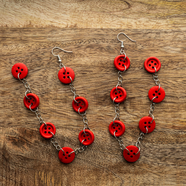 AE 16.1 Long hanging button earrings