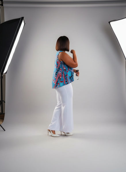 T15.2 High-Low Sleeveless Tank Top- Swirling abstract print in vibrant blue, red, and white tones