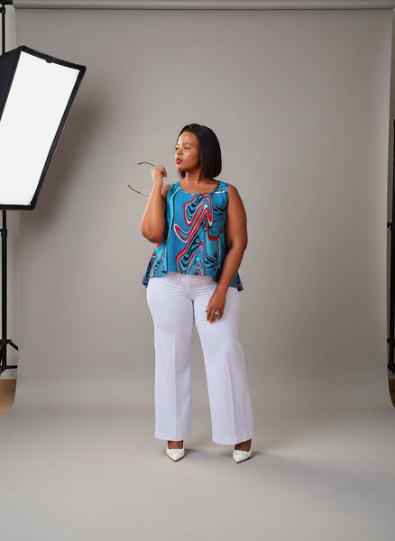 T15.2 High-Low Sleeveless Tank Top- Swirling abstract print in vibrant blue, red, and white tones