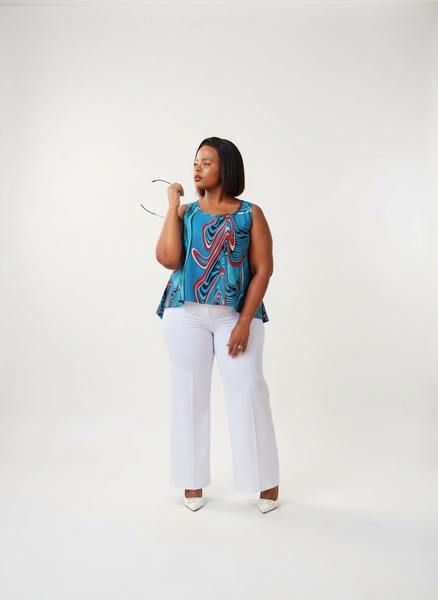 T15.2 High-Low Sleeveless Tank Top- Swirling abstract print in vibrant blue, red, and white tones