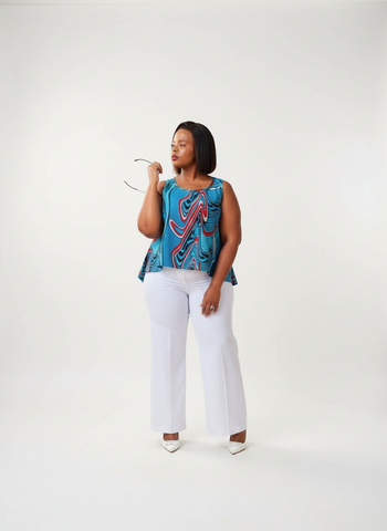 T15.2 High-Low Sleeveless Tank Top- Swirling abstract print in vibrant blue, red, and white tones