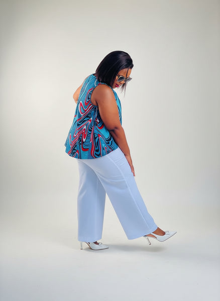 T15.2 High-Low Sleeveless Tank Top- Swirling abstract print in vibrant blue, red, and white tones